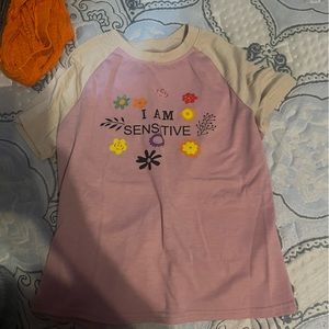 light pink with “i am sensitive” on it